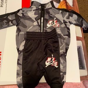 Newborn size Nike matching jumpsuit